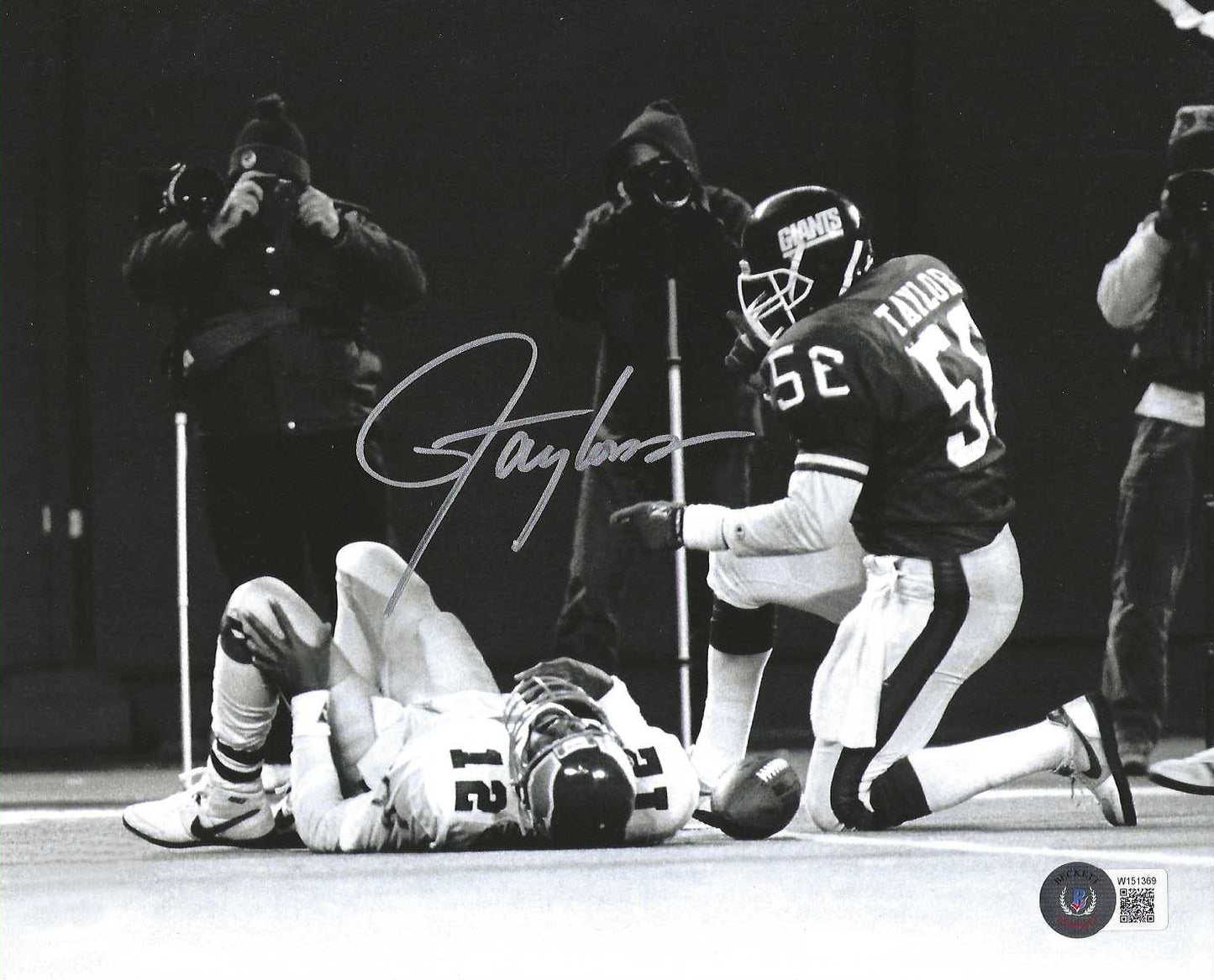 This photograph has been personally hand-signed by Lawrence Taylor. It comes with an individually numbered, tamper proof certificate of authenticity from Becketts. This ensures authenticity, and can be reviewed online. This shows that the product purchased is authentic and eliminates any possibility of duplication or fraud.